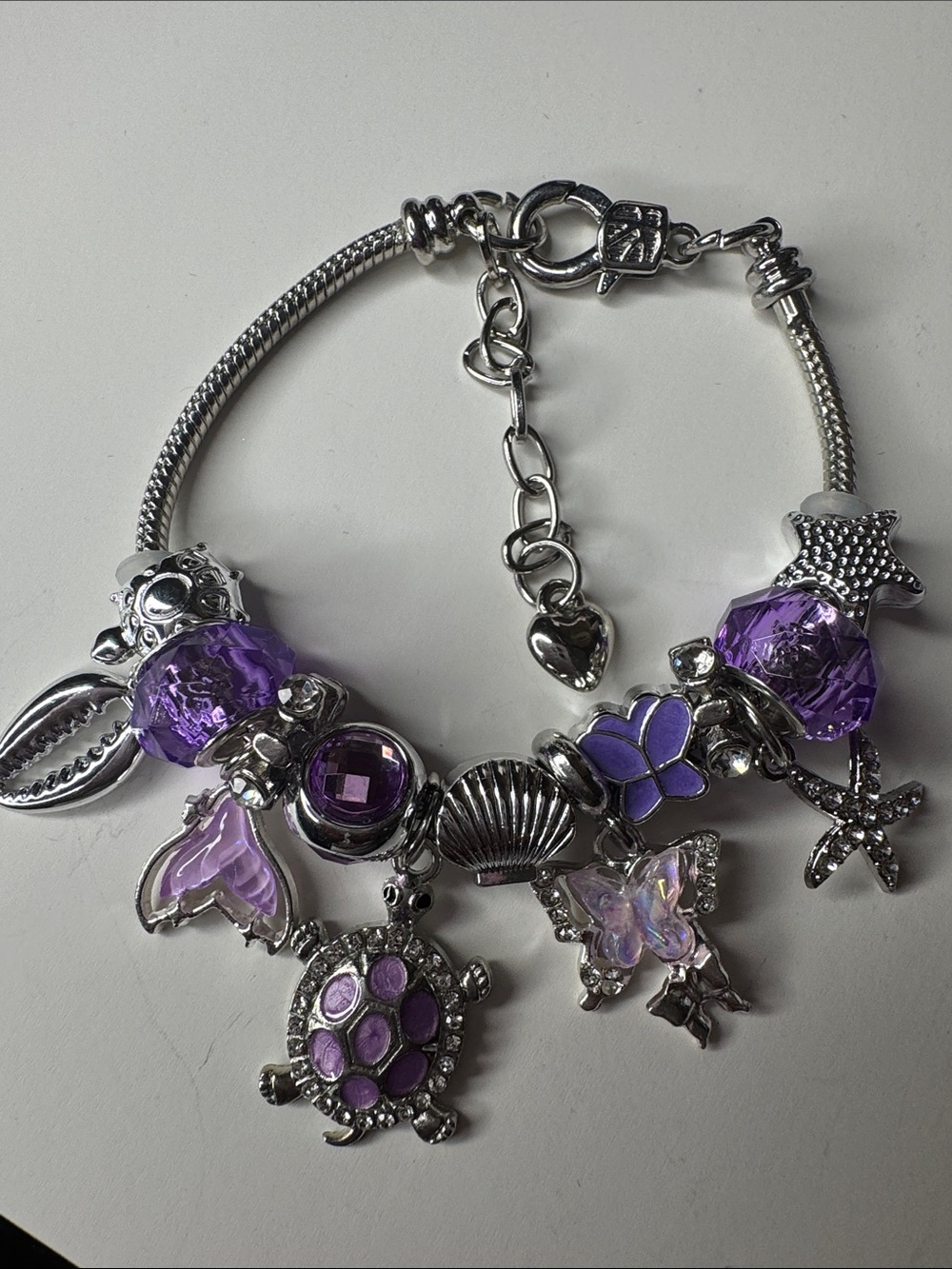Silver Charm Bracelet with Purple Beads and Ocean Charms